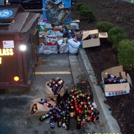 Over Flowing Drop Site - Glass Container After a Long Busy Weekend